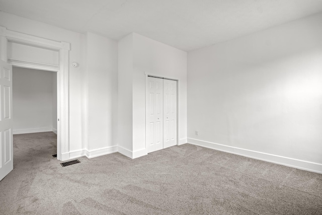 904 5th Ave, Dayton, KY 41074 - unfurnished bedroom featuring carpet, baseboards, and a closet