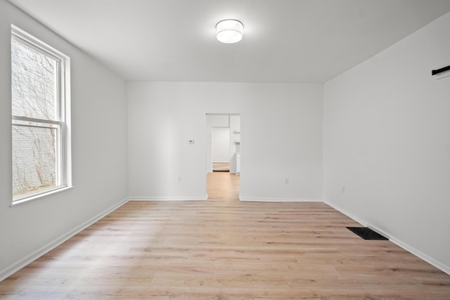 904 5th Ave, Dayton, KY 41074 - spare room featuring light wood-type flooring and baseboards