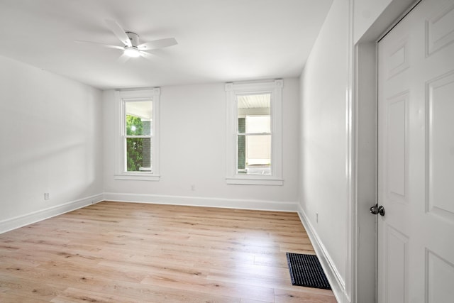 904 5th Ave, Dayton, KY 41074 - spare room with light wood finished floors, a ceiling fan, and baseboards