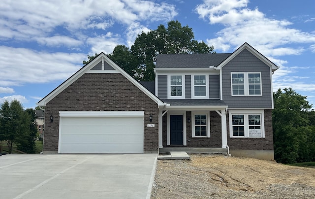 1196 Breckenridge Ln, Hebron, KY 41048 - view of front of property with concrete driveway, a garage, and brick siding
