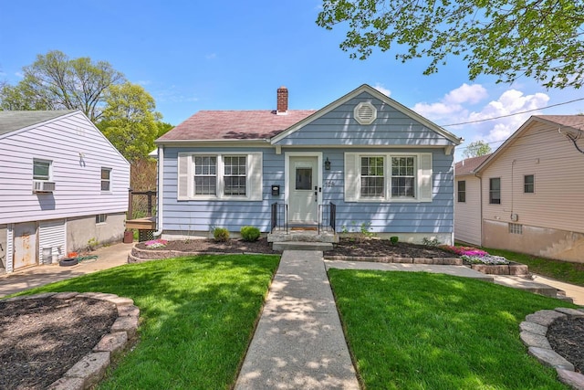 406 Hallam Ave, Erlanger, KY 41018 - view of front facade with a chimney and a front yard