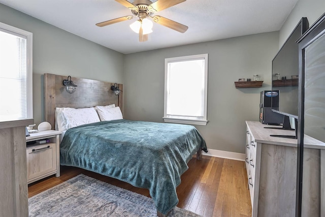 406 Hallam Ave, Erlanger, KY 41018 - bedroom featuring multiple windows, hardwood / wood-style floors, and baseboards