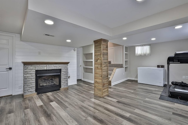 406 Hallam Ave, Erlanger, KY 41018 - workout room with wood finished floors, recessed lighting, a fireplace, baseboards, and ornate columns