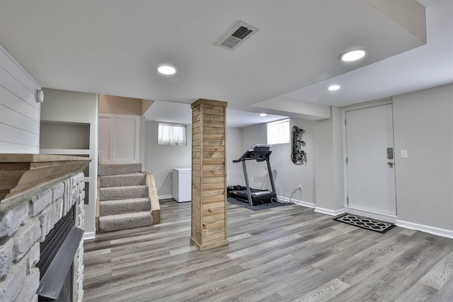 406 Hallam Ave, Erlanger, KY 41018 - workout room with wood finished floors, baseboards, recessed lighting, and a fireplace