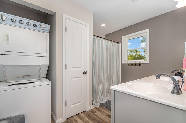 1500 Heathen Ridge Rd, Crittenden, KY 41030 - laundry room with estacked washer and dryer, light wood-style flooring, and recessed lighting