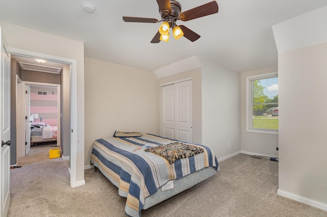 1500 Heathen Ridge Rd, Crittenden, KY 41030 - bedroom with light carpet, baseboards, a closet, a ceiling fan, and vaulted ceiling