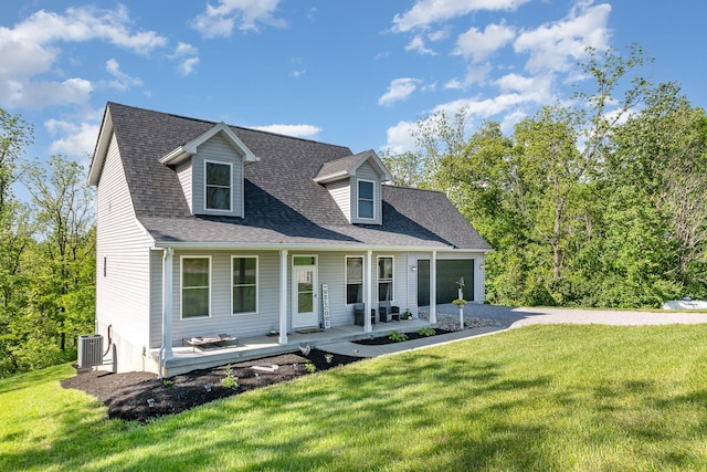 1500 Heathen Ridge Rd, Crittenden, KY 41030 - cape cod home with covered porch, a front yard, a garage, a shingled roof, and driveway