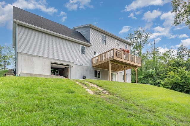 1500 Heathen Ridge Rd, Crittenden, KY 41030 - back of house featuring a lawn, a deck, and an attached garage