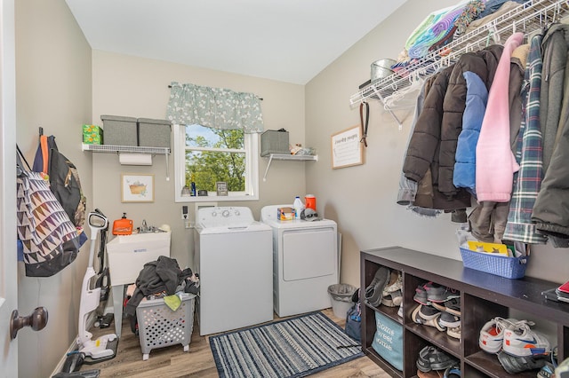 1500 Heathen Ridge Rd, Crittenden, KY 41030 - laundry area featuring washing machine and clothes dryer and wood finished floors
