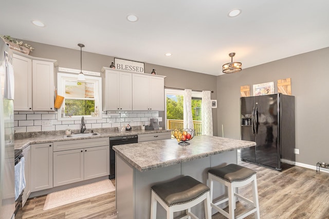 1500 Heathen Ridge Rd, Crittenden, KY 41030 - kitchen with black appliances, a sink, tasteful backsplash, light wood-type flooring, and recessed lighting