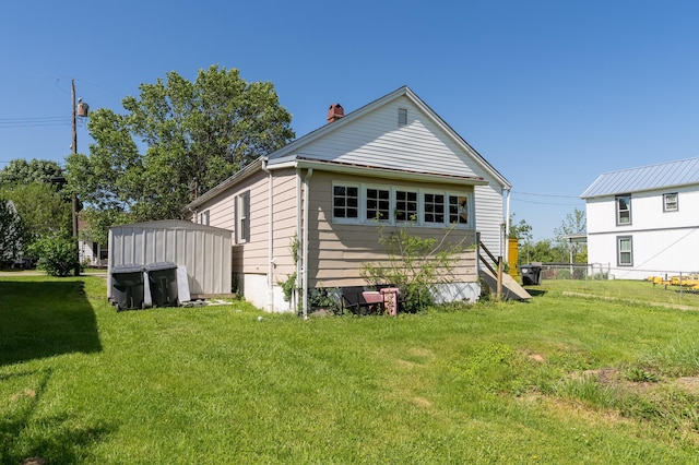 29 Locust St, Walton, KY 41094 - rear view of property with a chimney