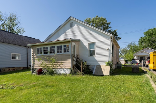 29 Locust St, Walton, KY 41094 - back of house with a lawn