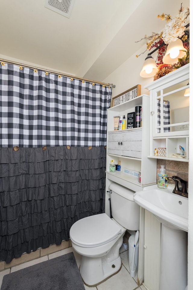 29 Locust St, Walton, KY 41094 - bathroom with tile patterned floors, toilet, and a shower with shower curtain