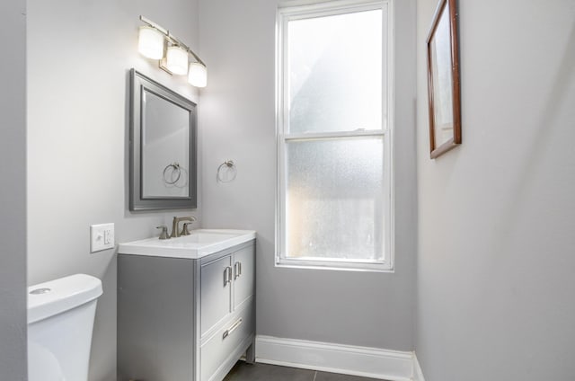 259 Van Voast Ave Unit 1, Bellevue, KY 41073 - half bath featuring plenty of natural light, toilet, and vanity