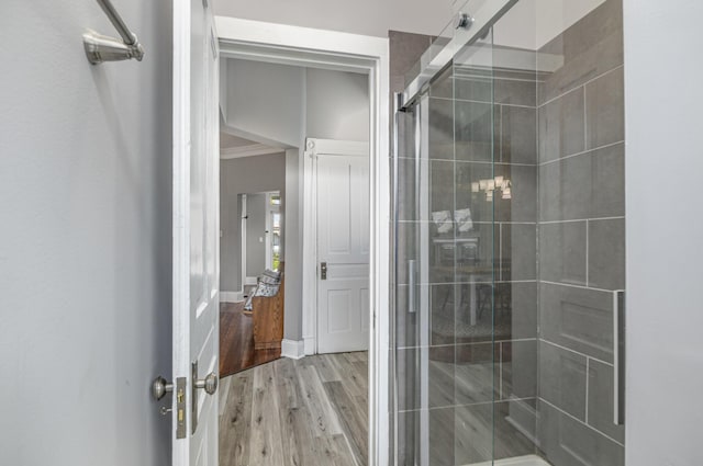 259 Van Voast Ave Unit 1, Bellevue, KY 41073 - full bathroom featuring a stall shower and wood finished floors