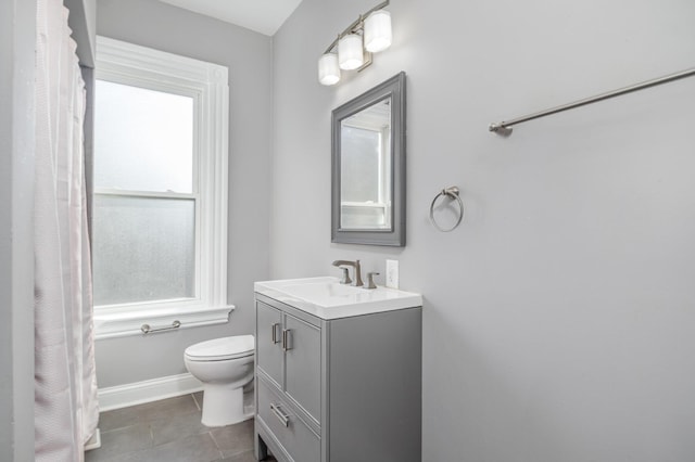259 Van Voast Ave Unit 1, Bellevue, KY 41073 - full bathroom with vanity, toilet, tile patterned flooring, and baseboards
