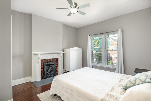 259 Van Voast Ave Unit 1, Bellevue, KY 41073 - bedroom featuring wood finished floors, a premium fireplace, baseboards, and ceiling fan