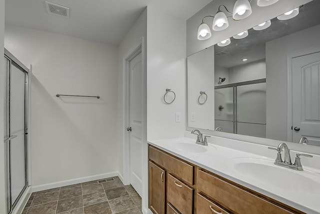 2345 John James Ct, Hebron, KY 41048 - full bathroom with a shower stall, double vanity, and baseboards