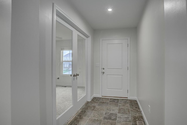 2345 John James Ct, Hebron, KY 41048 - doorway to outside with baseboards, dark stone finish flooring, and recessed lighting