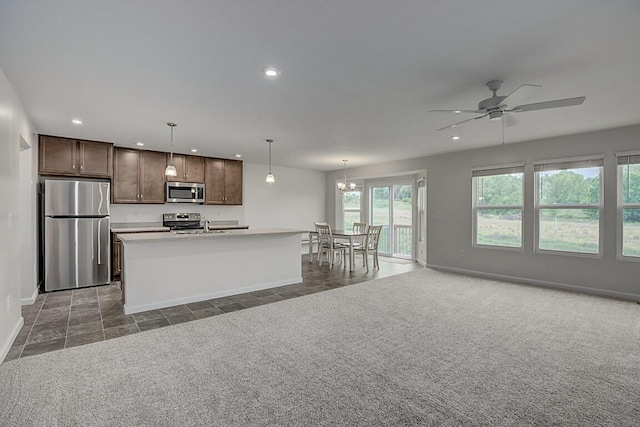 2345 John James Ct, Hebron, KY 41048 - kitchen with appliances with stainless steel finishes, open floor plan, recessed lighting, baseboards, and dark brown cabinets