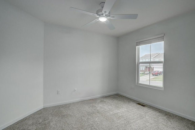 2345 John James Ct, Hebron, KY 41048 - spare room featuring carpet flooring, a ceiling fan, and baseboards