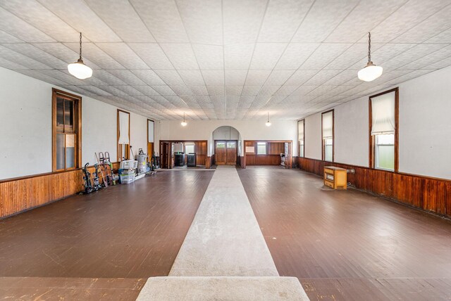 5489 Bridgeville Rd, Brooksville, KY 41004 - misc room featuring a wainscoted wall, wood walls, healthy amount of natural light, and wood finished floors