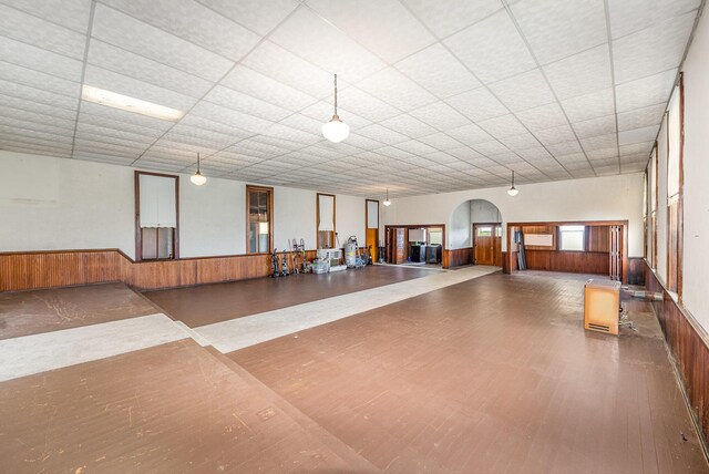5489 Bridgeville Rd, Brooksville, KY 41004 - miscellaneous room with wainscoting, wooden walls, and arched walkways