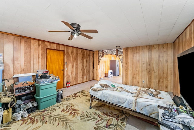 5489 Bridgeville Rd, Brooksville, KY 41004 - bedroom with wood walls, light carpet, and a ceiling fan
