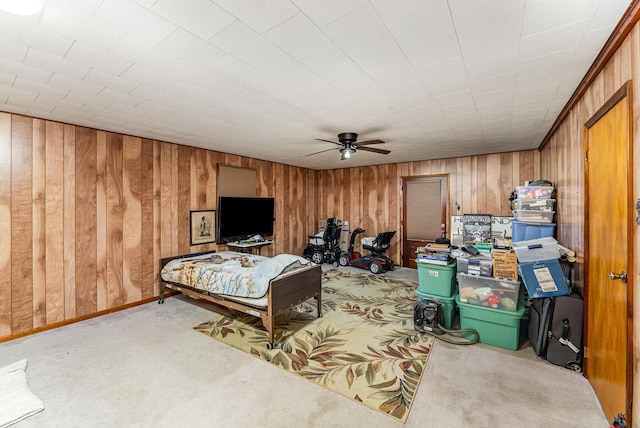 5489 Bridgeville Rd, Brooksville, KY 41004 - bedroom featuring light carpet, wooden walls, and a ceiling fan