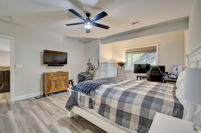 827 Iva Del Ct, Crescent Springs, KY 41017 - bedroom with light wood-type flooring, baseboards, and a ceiling fan