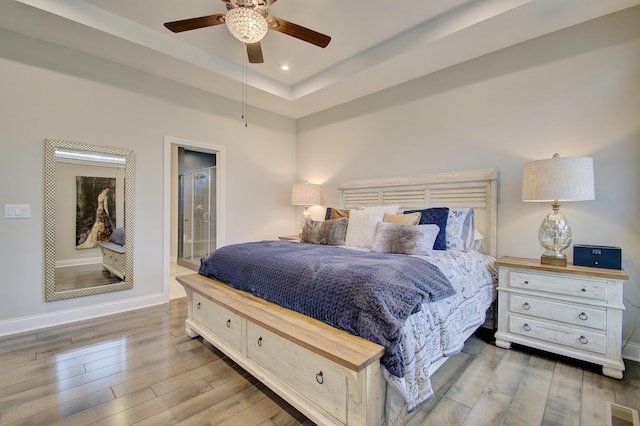 827 Iva Del Ct, Crescent Springs, KY 41017 - bedroom featuring wood finished floors, baseboards, a tray ceiling, recessed lighting, and a ceiling fan