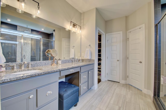 827 Iva Del Ct, Crescent Springs, KY 41017 - full bathroom with a shower stall, double vanity, a spacious closet, and baseboards