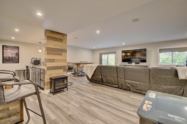 827 Iva Del Ct, Crescent Springs, KY 41017 - living area featuring recessed lighting, light wood finished floors, and a wood stove