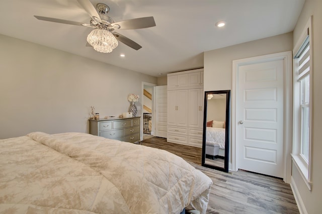 827 Iva Del Ct, Crescent Springs, KY 41017 - bedroom featuring wood finished floors, recessed lighting, a ceiling fan, and a closet