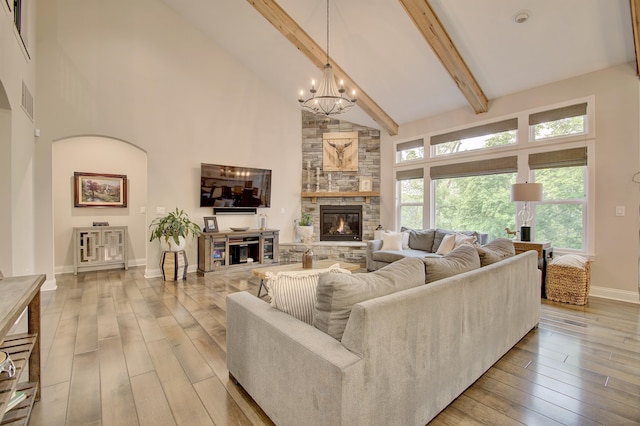 827 Iva Del Ct, Crescent Springs, KY 41017 - living area with light wood-style floors, beamed ceiling, a chandelier, high vaulted ceiling, and baseboards