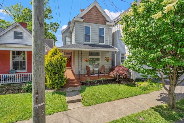 203 E Southern Ave, Covington, KY 41015 - view of front of home featuring covered porch and a front yard