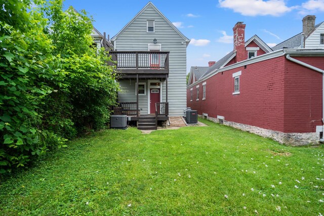 203 E Southern Ave, Covington, KY 41015 - back of house featuring cooling unit, a yard, and a balcony