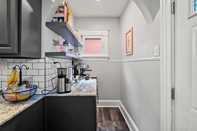 203 E Southern Ave, Covington, KY 41015 - kitchen with backsplash, dark wood-style floors, baseboards, light stone countertops, and open shelves