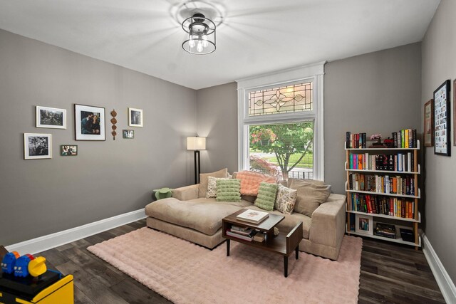 203 E Southern Ave, Covington, KY 41015 - living area featuring baseboards and dark wood-style flooring