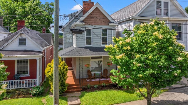 203 E Southern Ave, Covington, KY 41015 - view of front of home featuring a porch and a chimney