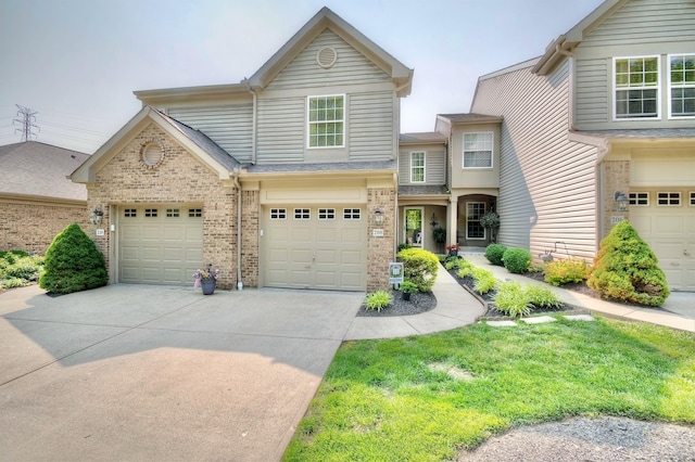 208 Misty Cove Way, Highland Heights, KY 41076 - view of front of home featuring concrete driveway and brick siding