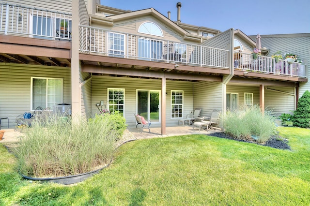 208 Misty Cove Way, Highland Heights, KY 41076 - back of property featuring a patio, a lawn, and a deck