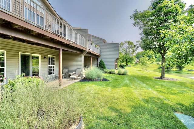 208 Misty Cove Way, Highland Heights, KY 41076 - view of green lawn with a patio and a deck