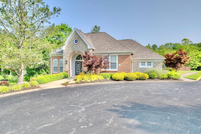 208 Misty Cove Way, Highland Heights, KY 41076 - view of front of house with stone siding and roof with shingles