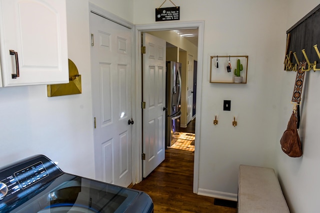 1496 Skye Dr, Independence, KY 41051 - washroom with washer / clothes dryer, dark wood finished floors, baseboards, and cabinet space