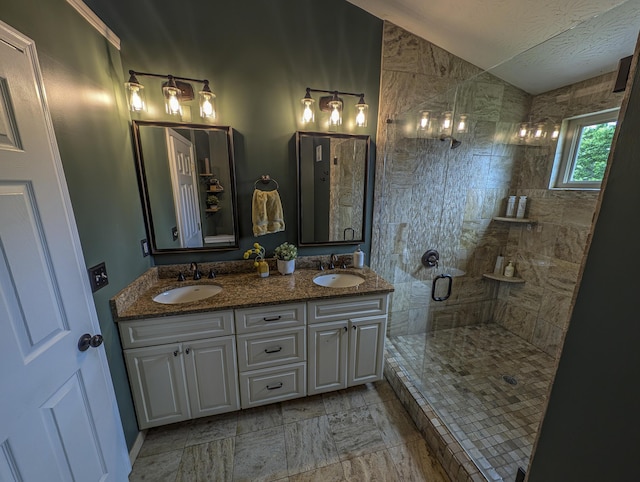 1496 Skye Dr, Independence, KY 41051 - bathroom featuring a stall shower, double vanity, vaulted ceiling, and a textured ceiling