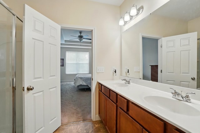 1344 Wilshire Ct, Union, KY 41091 - ensuite bathroom featuring double vanity, a shower with shower door, a ceiling fan, and baseboards