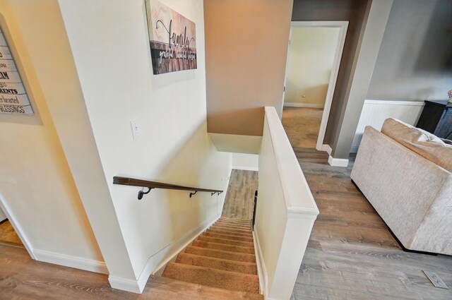 1344 Wilshire Ct, Union, KY 41091 - stairway featuring baseboards and wood finished floors