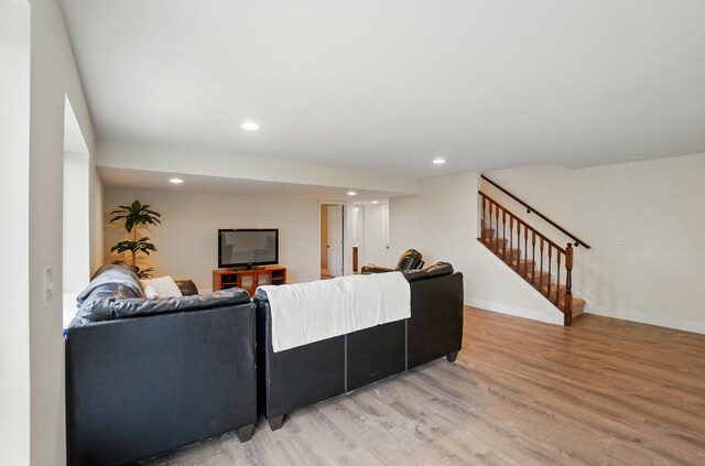 1344 Wilshire Ct, Union, KY 41091 - living room with light wood-style flooring, stairway, baseboards, and recessed lighting