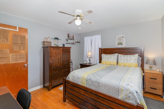 10 Juarez Cir, Covington, KY 41017 - bedroom featuring light wood-style floors, baseboards, and a ceiling fan
